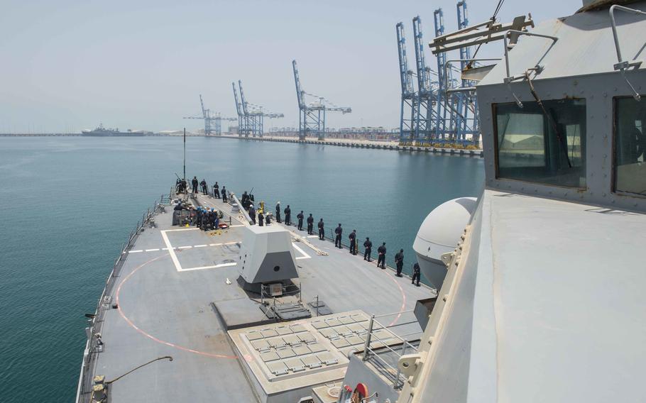 Sailors man the rails as the guided-missile destroyer USS Farragut (DDG 99), a guided-missile destroyer, enters Port Khalifa, Abu Dhabi, June 30, 2015. U.S. officials are focused on the Khalifa Port, about 50 miles north of the capital, where a Chinese shipping conglomerate operates.