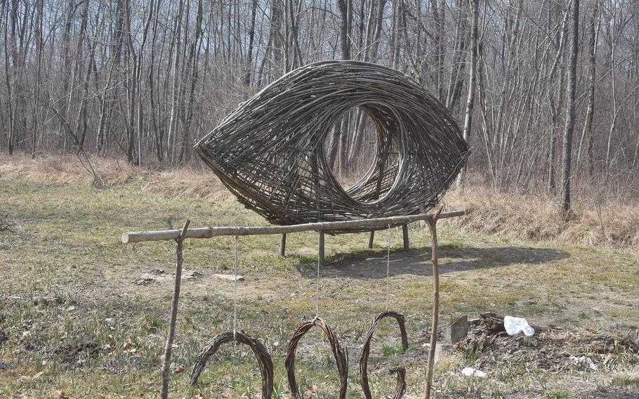 This eyeball made from the plentiful supply of branches and sticks, in the "naturalistic oasis" along the shores of Lago Santa Croce in Italy, is one of a handful of local art projects exhibited along the walk.