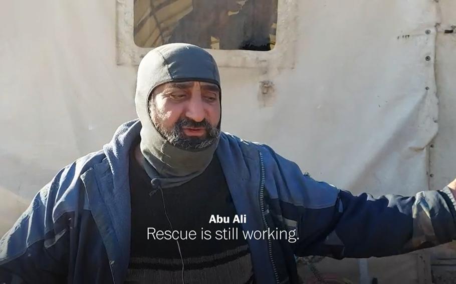 In this screenshot from video, Abu Ali, a Syrian man in Kamuneh, describes missing food and clothes following the powerful earthquake on Feb. 6, 2023, that struck Syria and Turkey.