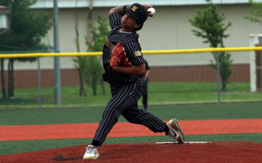 Humphreys right-hander Christian Whiting delivers against Osan during Tuesday's DODEA-Korea baseball game. The Cougars won 12-5.