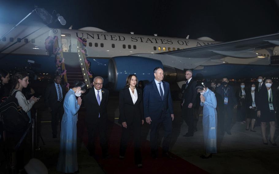Vice President Kamala Harris and her husband Doug Emhoff arrive at Don Mueang International Airport in Bangkok, Thailand on Thursday, Nov. 17, 2022, to attend the Asia-Pacific Economic Cooperation (APEC) summit.