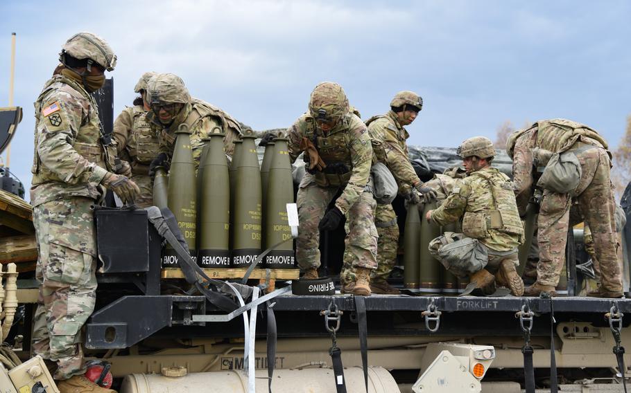 U.S. soldiers unload M777A2 Howitzer ammunition bound for Ukraine at the 7th Army Training Command’s Grafenwoehr Training Area, Germany, in November.