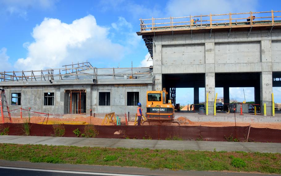 Construction workers make progress on a fire station at Camp Blaz, Guam, Friday, Dec. 9, 2022.