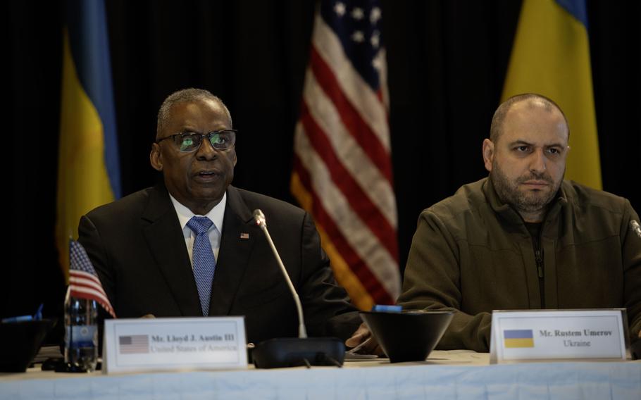 U.S. Defense Secretary Lloyd Austin, left, gives opening remarks next to his Ukrainian counterpart, Rustem Umerov, during the Ukraine Defense Contact Group meetings at Ramstein Air Base, Germany, Tuesday, March 19, 2024.