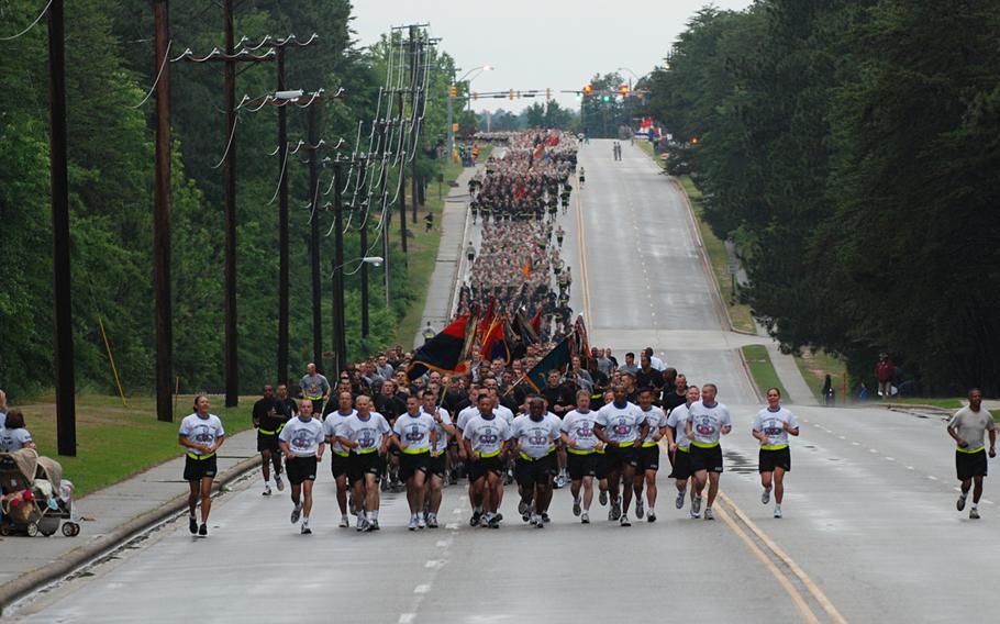 The 82nd Airborne Division command group leads the division’s paratroopers on a run down Longstreet Road on Fort Bragg, N.C., during the kickoff event for the All American Week celebration in May 2009.