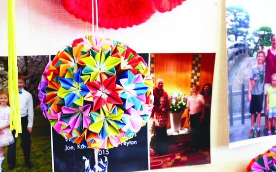 61p bs
James Kimber/Stars and Stripes

An intricate origami gift hangs on the wall in the Terauchi Daini temporary housing complex community room Feb. 11, 2016, in Minamisoma, Japan. The housing area's residents give these gifts to visitors and volunteers, many of whom come from U.S. military bases in Japan. 