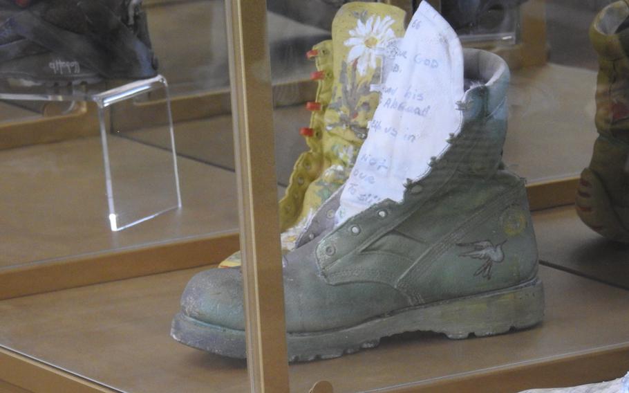 One of the boots in the Footsteps to Freedom art installation currently on exhibit at Walter Reed.