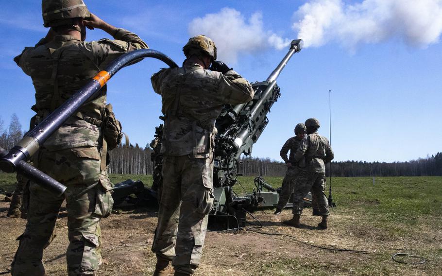 U.S. soldiers from the 82nd Airborne Division fire an M777 howitzer during an exercise at Tapa Central Training Area, Estonia, in May 2021. A virtual meeting of foreign and defense ministers from NATOs 30 members discussed stances on Russia, Afghanistan and other issues on June 1, 2021, ahead of a heads of states and governments summit scheduled for June 14.