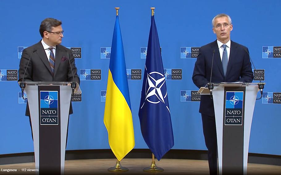 Dmytro Kuleba, Ukraine’s foreign minister, listens to NATO Secretary-General Jens Stoltenberg at the alliance’s headquarters in Brussels on Nov. 15, 2021. Kuleba called on NATO to deliver more support to his country as it faces a Russian military buildup near its eastern border and a migrant crisis on its border with Belarus.