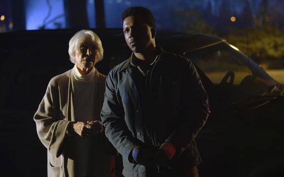 Ellen Burstyn, left, and Leslie Odom, Jr., star in “The Exorcist: Believer.” 