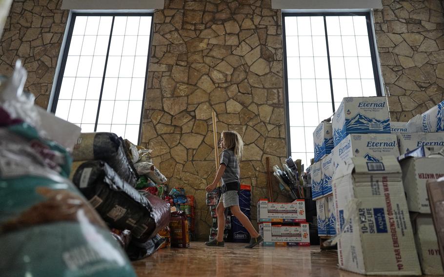 Stacks of boxes and packages indoors seen from the floor-level.