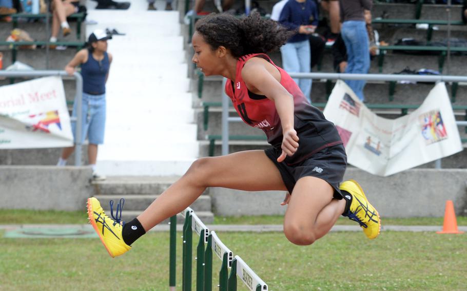 Nina Gaudin clears a hurdle.