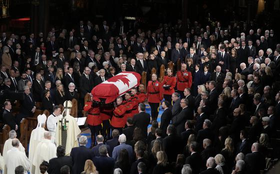 RCMP pallbearers carry the casket funeral of former prime minister Brian Mulroney at the Notre-Dame Basilica in Montreal, Saturday, March 23, 2024. (Adrian Wyld /The Canadian Press via AP)
