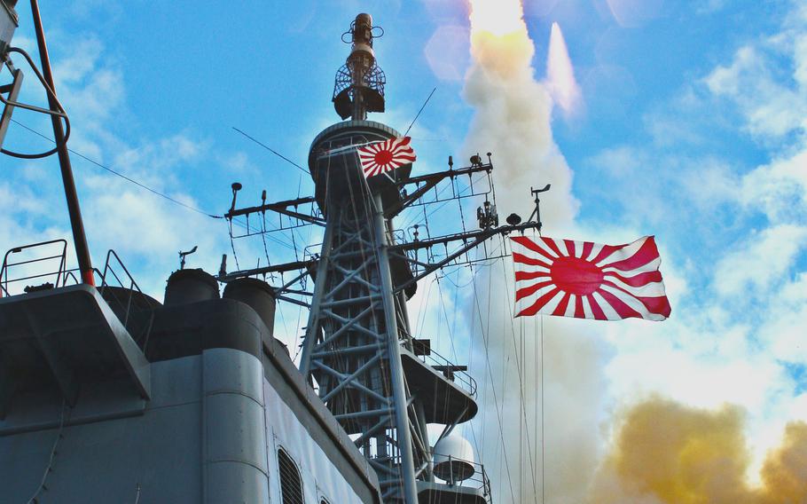 An SM-3  missile, the type fired by the Aegis Combat System, departs  the Japanese destroyer JS Kirishima during a test at Barking Sands, Kauai, Hawaii, on Oct. 28, 2010.