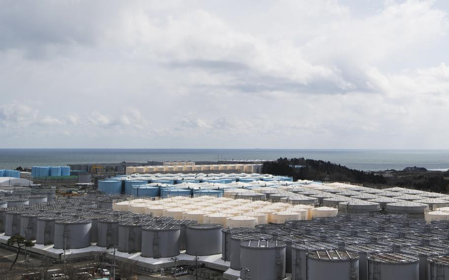 Tanks (in gray, beige and blue) store water that was treated but is still radioactive after it was used to cool down spent fuel at the Fukushima Daiichi nuclear power plant in Okuma town, Fukushima prefecture, northeastern Japan, Feb. 27, 2021. Technicians at Japan's wrecked Fukushima nuclear power plant neglected to investigate the cause of faulty filters that were discharging dangerously radioactive water into the sea, company officials admitted Tuesday, Sept. 14, 2021, after being forced to repair the filters.