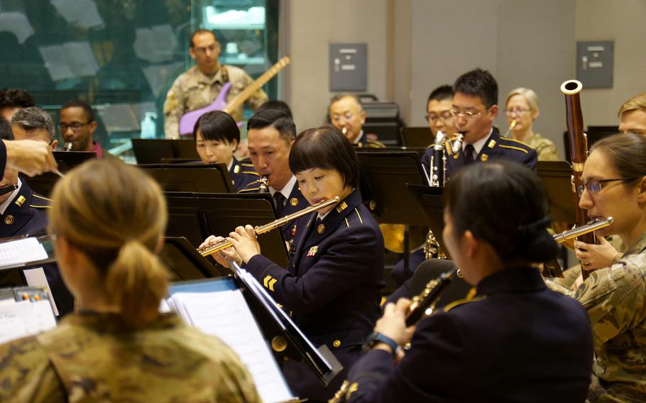 Members of the U.S. Army Japan and Japan Ground Self-Defense Force bands practice at Camp Zama, Japan, Dec. 13, 2023.