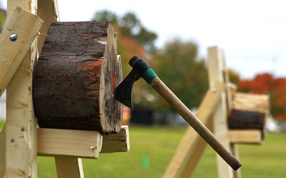 An axe sticks to a block of wood during the axe throwing event of the 693rd Intelligence, Surveillance, and Reconnaissance Group’s Highland Games at Wiesbaden, Germany, Oct. 11, 2017. The group’s Airmen are scattered in several U.S. military installations in Germany, and converge every year for the games. (U.S. Air Force photo by Airman 1st Class Joshua Magbanua)