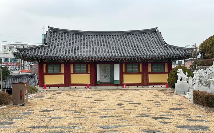The main lecture hall at Gwollisa Shrine in Osan, South Korea, houses many statues and artifacts, including writings that date back centuries.