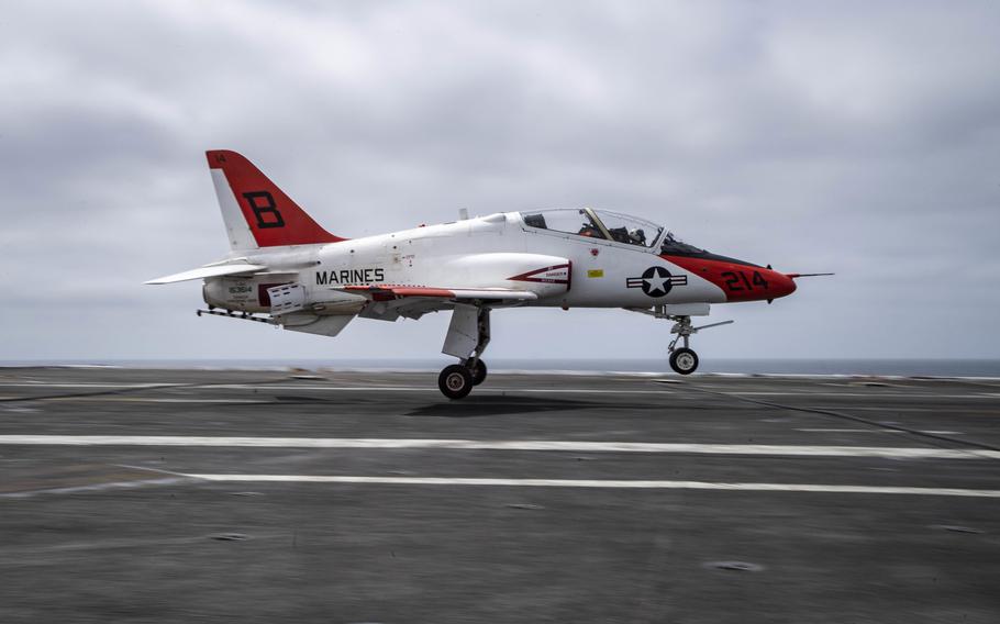 A T-45C Goshawk from Training Squadron 22 performs a touch-and-go on the flight deck of the aircraft carrier USS Nimitz, March 16, 2022, in the Pacific Ocean.