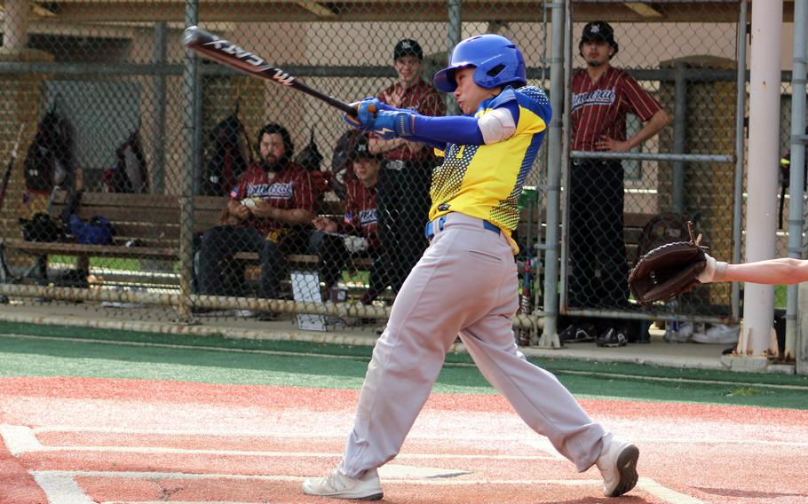 Yokota's Taiga Arakaki takes his cuts during Monday's Division II baseball tournament. The Panthers won 5-2 over Matthew C. Perry and 6-3 over host Osan.