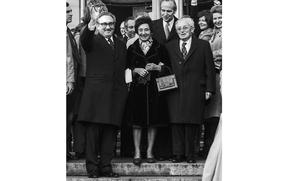 Fürth, Germany, December, 1975: With his parents at his side, Henry Kissinger waves to the crowd gathered in his hometown for a ceremony at which he was presented with Fürth's Golden Citizen's Medallion. The Kissingers fled Fürth for the U.S. in 1938, but the secretary of state noted in his acceptance speech that "I believe that my visit here exemplifies the extraordinary rebirth of friendship between the American people and the German people." He added that his parents, Louis and Paula Kissinger, "have never lost their attachment to this city in which they spent the greater part of their lives."
