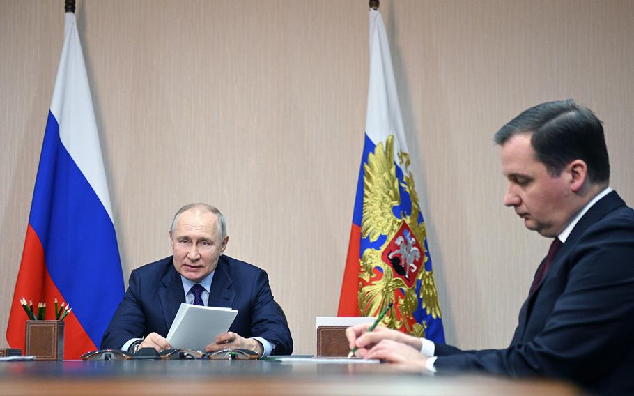 Russian President Vladimir Putin, left, and Arkhangelsk Region Governor Alexander Tsybulsky, attend a meeting in Oktyabrsky, Arkhangelsk region, Russia, on Friday, Feb. 10, 2023.  Officials of Moldova summoned Russia’s ambassador over an allegation of a violation of airspace.