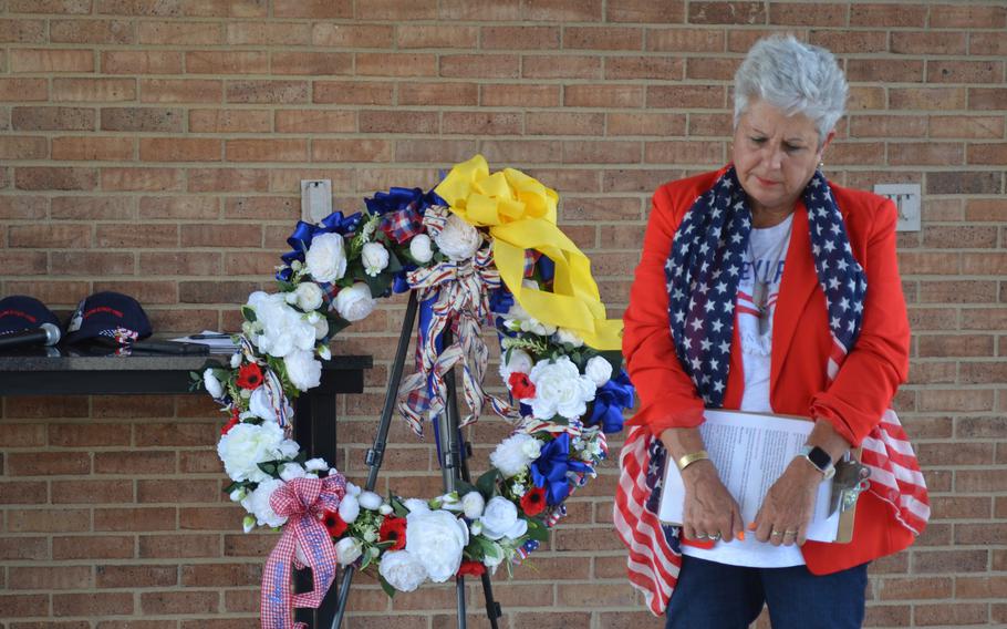 Margie Taylor, whose son Spc. Joey Lenz died at Fort Cavazos, Texas, prays during an event Tuesday, May 23, 2023, at Central Texas State Veterans Cemetery in Killeen. She held the event to raise awareness about noncombat deaths in the military. 