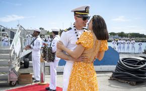250316-N-EI510-1210 Joint Base Pearl Harbor-Hickam, Hawaii, March 16, 2025 – Lt. Erich Eden greets his girlfriend after the Virginia-class fast-attack submarine USS Vermont (SSN 792) returned to Joint Base Pearl Harbor-Hickam, Hawaii following a scheduled deployment, March 16, 2025. Vermont is the third U.S. Navy ship named after the Green Mountain State. Vermont was administratively commissioned in April 2020 and is the first Block IV Virginia-class fast-attack submarine. (U.S. Navy photo by Mass Communication Specialist 1st Class Scott Barnes)