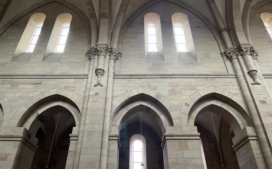 Inside the Otterberg abbey looking towards the stained-glass windows.