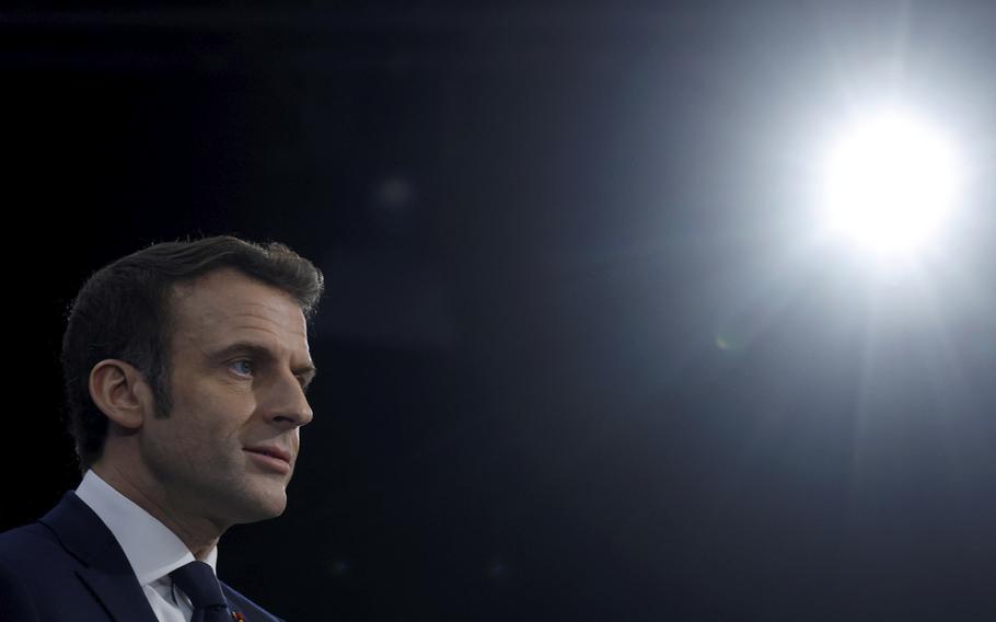 French President Emmanuel Macron attends an informal meeting of European space ministers, in Toulouse, southwestern France, Wednesday, Feb. 16, 2022. (Gonzalo Fuentes/Pool via AP)