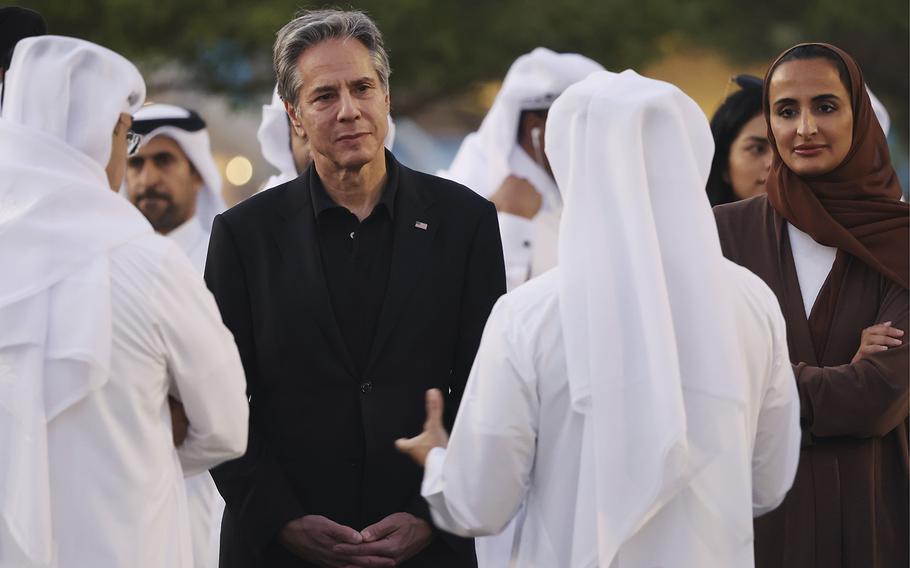 U.S. Secretary of State Anthony Blinken, left, and Vice Chairperson and CEO of Qatar Foundation, Sheikha Hind bint Hamad al-Thani, right, listen to officials during a visit to Oxygen Park at Education City, in Doha Qatar, on Monday, Nov. 21, 2022.