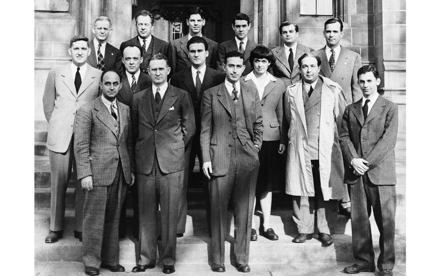 Physicist Leona Woods (Leona Woods Marshall Libby), second row, second from right, with colleagues at the University of Chicago in 1946. Woods worked with Enrico Fermi at a Manhattan Project site in Chicago that developed the first nuclear reactor. 