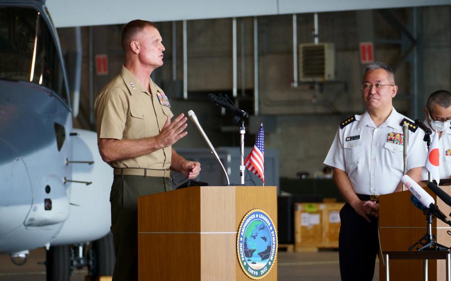 Lt. Gen. Steven Rudder, commander of U.S. Marine Corps Pacific, and Gen. Yoshihide Yoshida, chief of staff of Japan's Ground Self-Defense Force, speak to reporters during the PALS '22 closing ceremony at Camp Kisarazu, Japan, on June 16, 2022. 