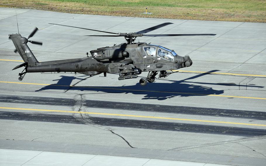 An Army AH-64 Apache helicopter departs Fort Wainwright, Alaska, Sept. 25, 2022,
on a training flight. 