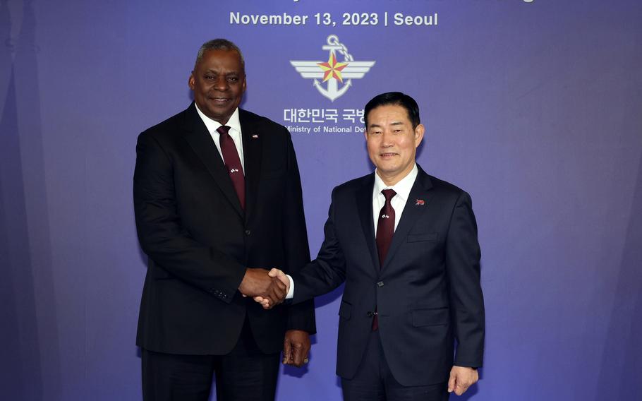 Secretary of Defense Lloyd Austin poses with South Korean Defense Minister Shin Won-sik at the Ministry of National Defense headquarters in Seoul, South Korea, Monday, Nov. 13, 2023. 