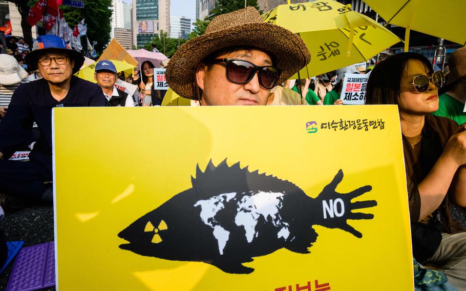 Activists gather to protest against a planned release of water from the Fukushima Dai-Ichi nuclear plant in Japan, in Seoul, South Korea, on June 24, 2023.
