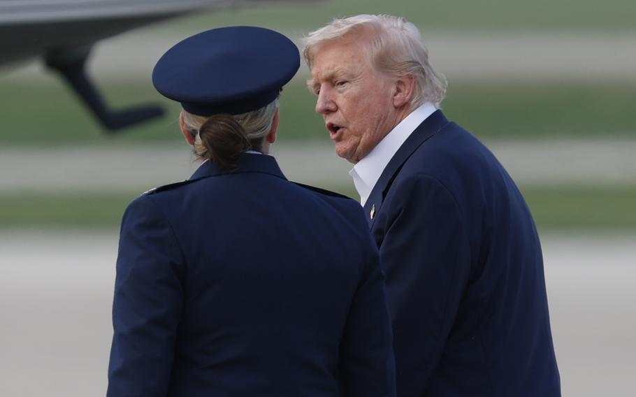 President Trump meets speaks with Air Force Commander Melissa Dombrock.