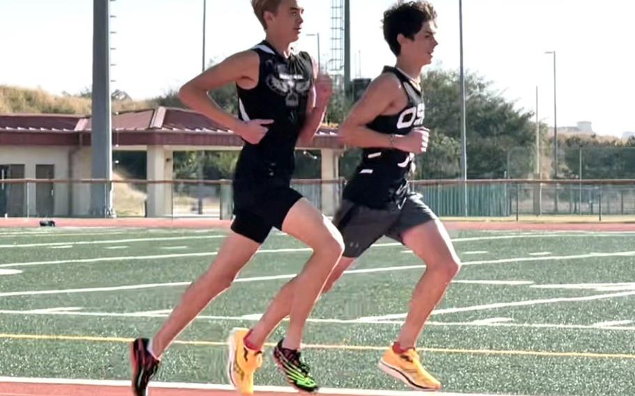 Osan American’s Sam Wood, right, finished first in the KAIAC cross country finals, while last year’s DODEA-Korea champion Drew Wahlgren placed third.