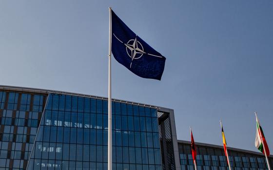 A NATO Star logo flag flies during the military and political alliance's summit at the North Atlantic Treaty Organization (NATO) headquarters in Brussels on July 12, 2018. MUST CREDIT: Bloomberg photo by Marlene Awaad.