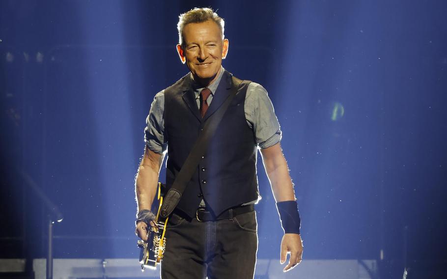 Bruce Springsteen smiles while performing with the E-Street Band at Pechanga Arena on March 25 in San Diego. His 1984 hit, “Born in the U.S.A,” is often mistaken for a celebration of patriotism but is more of a critical commentary on the struggles of Vietnam veterans returning home.