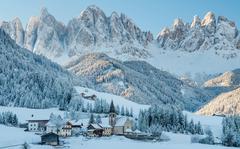 The small village of Val di Funes lies covered in snow with the Dolomites mountains as a backdrop in South Tyrol, Italy. Ansbach Outdoor Recreation offers a skiing and snowboarding trip to the Dolomites scheduled for Jan. 14-17. 