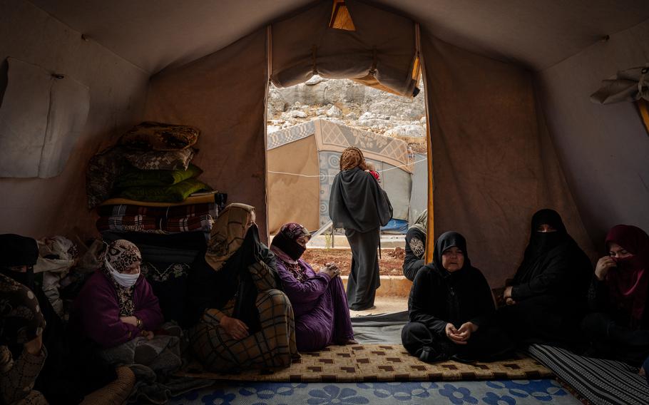 Saleh Mohammed al-Kanash's female relatives mourn for him on Oct. 17, 2021, at the Kili Camp for internally displaced persons. 