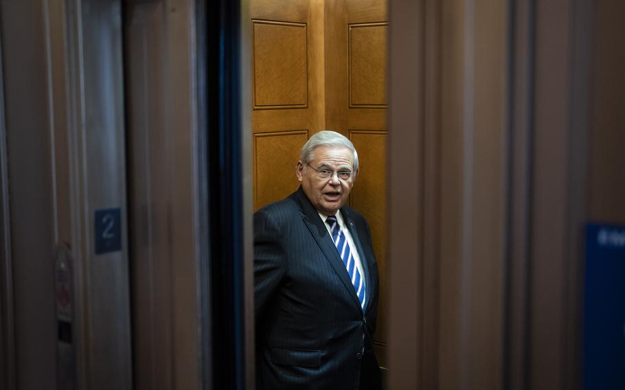 Sen. Bob Menendez, D-N.J., walks back to his office after a vote in December.