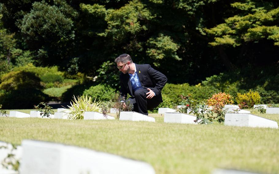 A rabbi pays his respects to World War II prisoners of war.