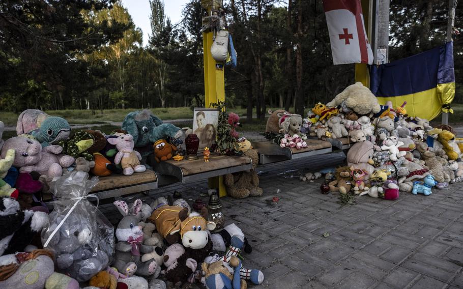 A bus stop that is now also a shrine to the victims of Russia’s strike in January. 