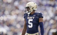 Navy cornerback Michael McMorris waits for a play against Cincinnati during the first half of an NCAA college football game, Saturday, Oct. 23, 2021, in Annapolis, Md. (AP Photo/Julio Cortez)