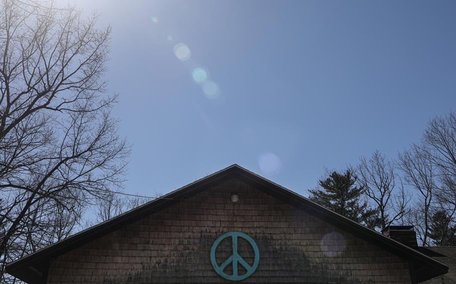 Tim McLaughlin’s peace sign on the front of his garage. 