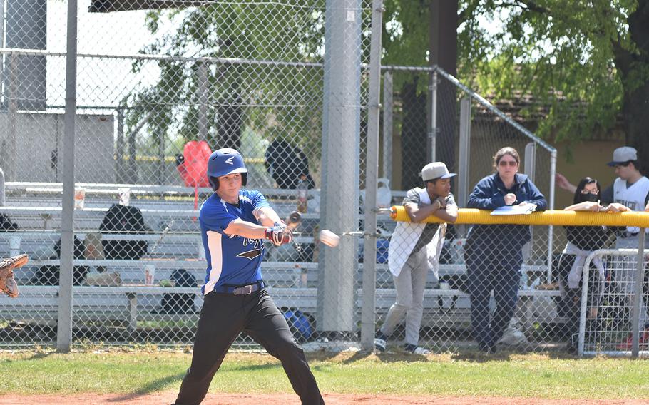 Hohenfels' Gunnar McLean connects bat with ball and reached first base on an error Saturday, April 30, 2022 in a game against Sigonella at Aviano Air Base, Italy.