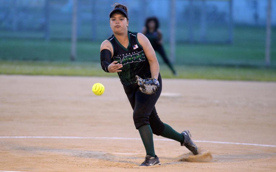Kubasaki right-hander Mia Vedsted delivers against Yokota in the first game of Friday's softball twin bill. The Dragons swept the Panthers 19-18 and 14-7.