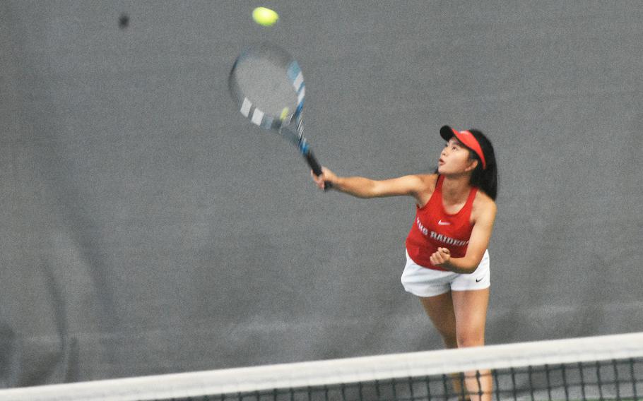 Hannah San Pedro of Kaiserslautern serves in the girls singles semifinals Friday, Oct. 22, 2021, at the DODEA-Europe tennis championships.